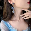Glittering Star And Moon Drop Earrings 1 Glittering Star And Moon Drop Earrings -Clothing Discount Store celestial glittering star moon drop earrings 542